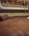 Crawl space drainage matting installed in a home in Carthage