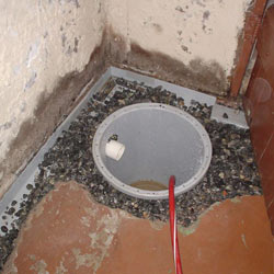 Installing a sump in a sump pump liner in a Asheboro home